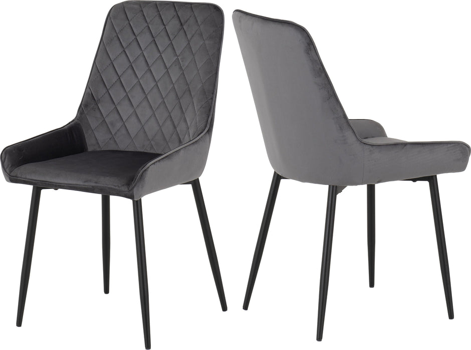 avery grey velvet dining chairs with black diamond patterned seat on a white background