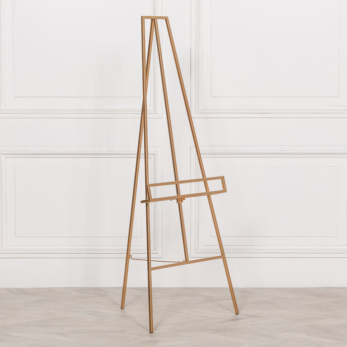 Contemporary bright gold metal easel with adjustable shelf – modern minimalist display stand

