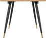 Close up of a hamilton large dining table with black legs and gold tips on a white background