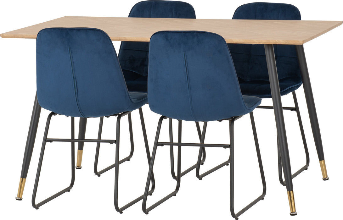 oak table with blue velvet dining chairs