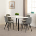 white marble dining set with grey chairs