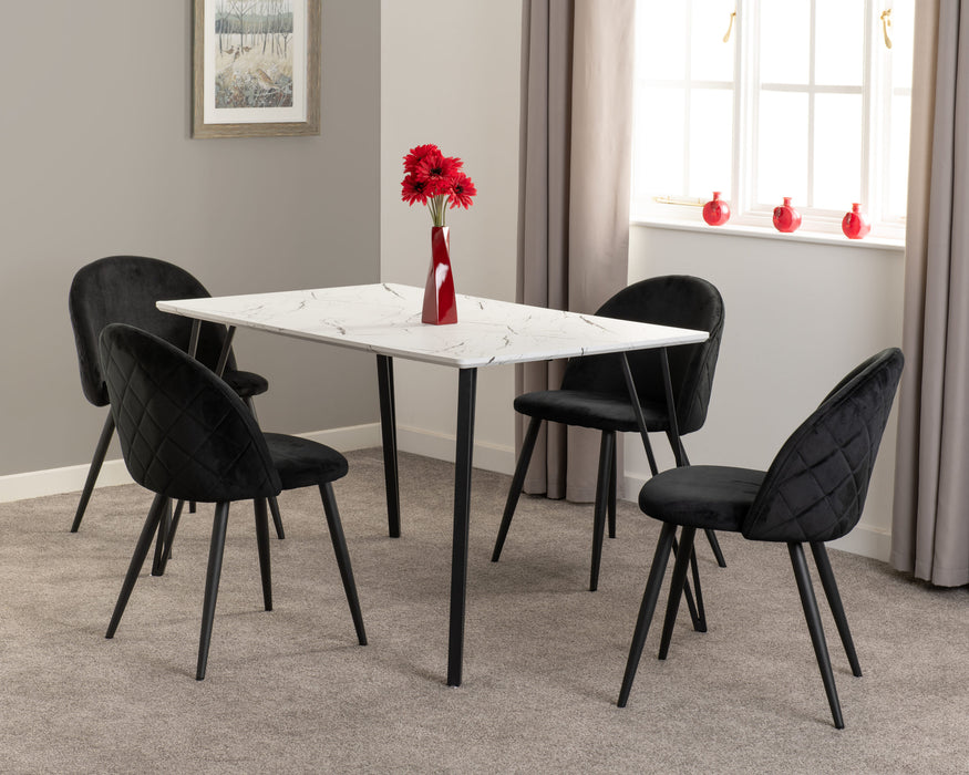 white marble dining set with black velvet chairs