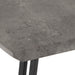 wave edge concrete effect dining table corner close up